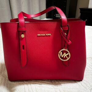 Michael Kors Mel Small Leather Tote
Crimson NWT Crossbody and shoulder.